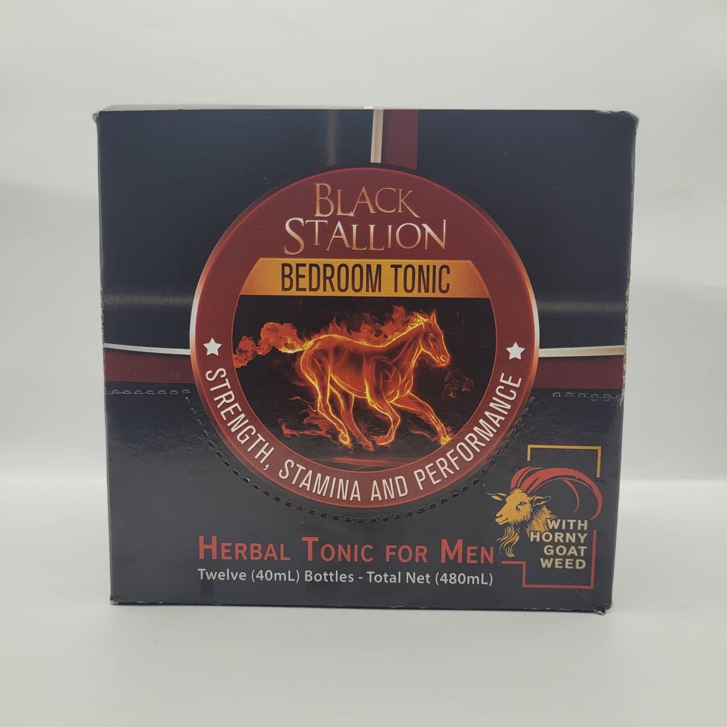 Front view of the Black Stallion 12-Pack retail box, featuring the 'Bedroom Tonic' logo with a flaming horse and 'Strength, Stamina and Performance' text.