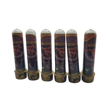 Six 1.5oz bottles of authentic Black Stallion Jamaican Herbal Tonic arranged in a row on a white background, showcasing the traditional dark labels