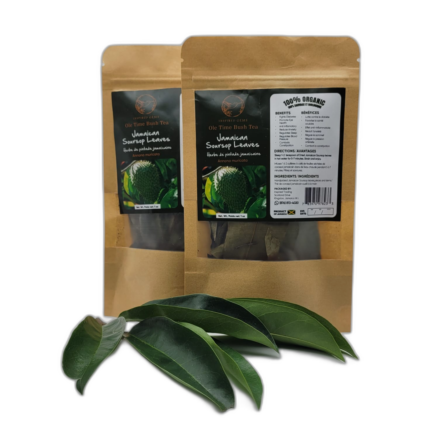 Two resealable brown kraft pouches of Inspired Gems Organic Jamaican Soursop Leaf Tea standing behind several fresh, dark green soursop leaves on a white background
