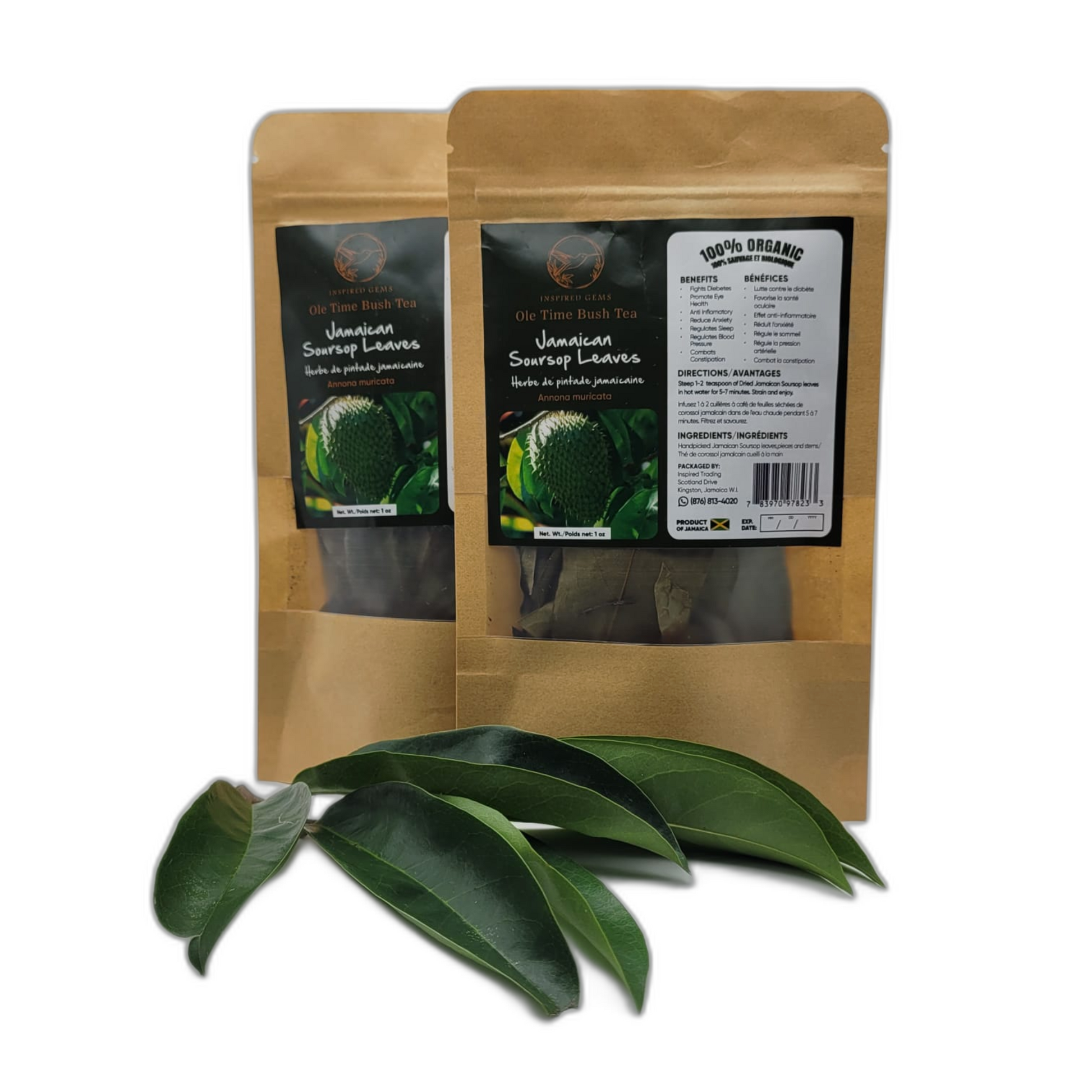 Two resealable brown kraft pouches of Inspired Gems Organic Jamaican Soursop Leaf Tea standing behind several fresh, dark green soursop leaves on a white background